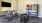 a room with a tv and exercise equipment
