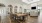 a large dining room and chairs in a clubhouse