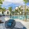 a pool with chairs around it