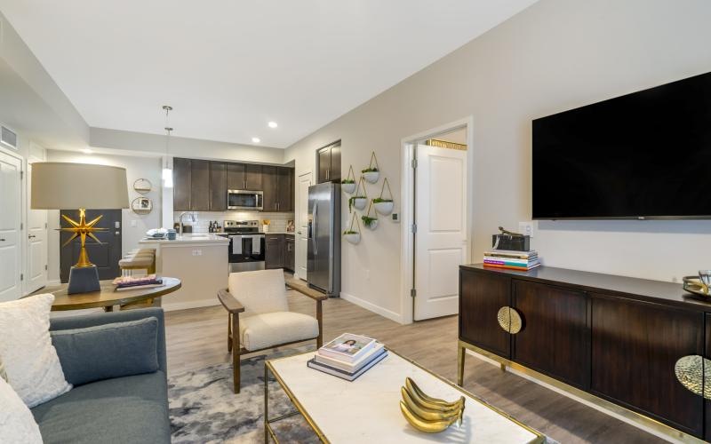 a living room with a tv and couch