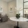 a room with a table and chairs